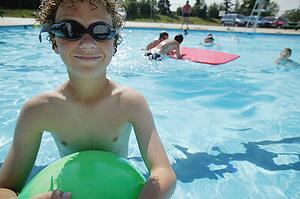 Boy in swimming pool