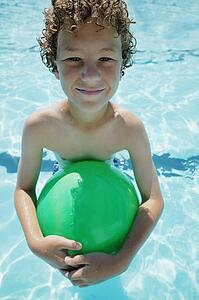Boy in swimming pool