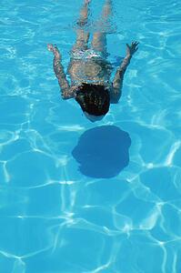 Woman swims underwater