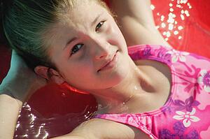 Girl relaxes in bathing suit
