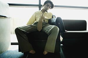 Businessman takes a nap