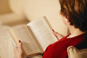 Woman reads a book
