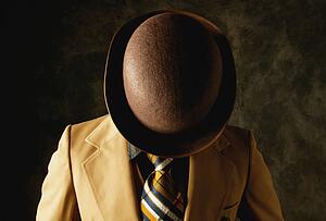 Man hides his face