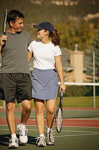Couple in tennis courts