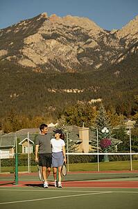 Couple in tennis courts