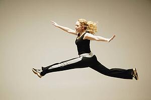 Woman leaps in the air