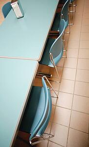 Tables and chairs in a school cafeteria