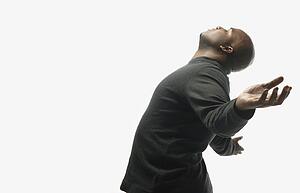 Man with arms raised