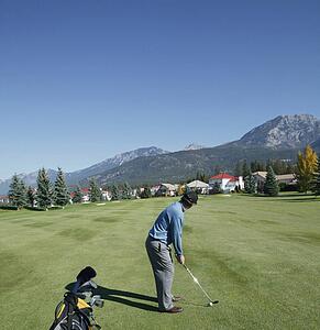 Man playing golf