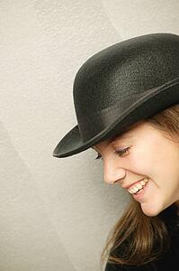 Woman with black hat