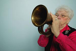Woman plays horn