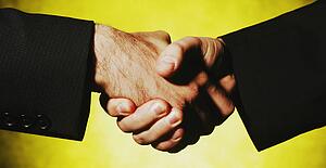 Businessmen shake hands