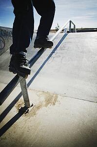 Skating down a rail