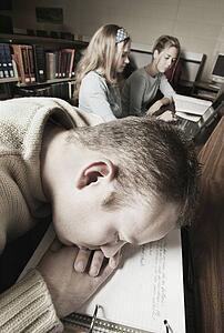 Student falls asleep on notes