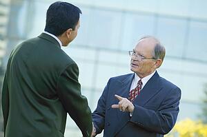 Businessmen shake hands