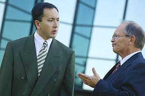 Businessmen have a discussion