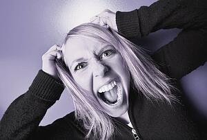 Woman pulls her hair out