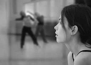 A dancer watches
