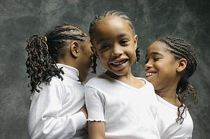 Three children laughing