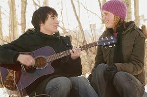 Man serenades woman