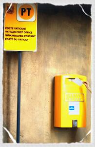 Tourist mailing postcard at Vatican City. Rome Italy