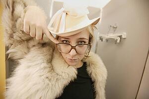 Woman tries on a fur coat