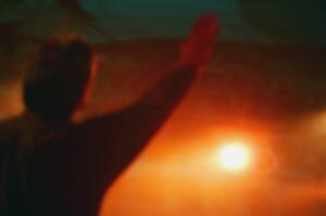 A man with arms raised