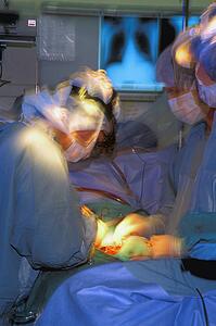 Surgeons Operating on Patient 