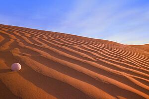 Golf Ball on Sand Dune Great Sand hills Sceptre Saskatchewan Canada
