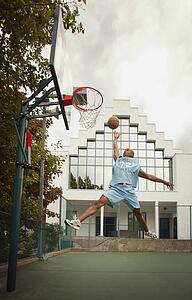 Man plays basketball