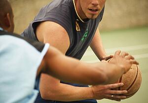 Playing basketball
