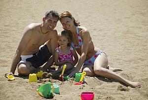 A family on the beach
