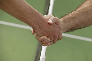 Handshake before a tennis game