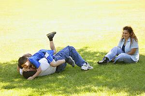 Family plays outside