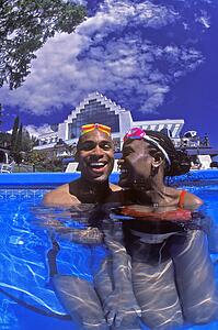 Couple having fun in swimming pool