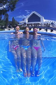 Portrait of three women in swimming pool