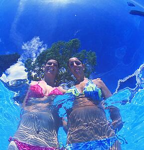Couple of young women in the pool