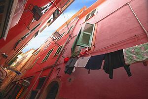 Looking up at apartments Vernazza Cinque Terre Italy