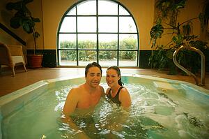 Happy couple in hot tub
