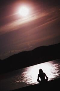 young woman by lake