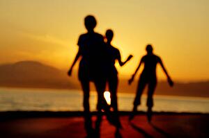 Soft focus of people and a sunset