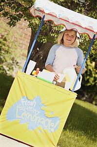 Girl at lemonade stand