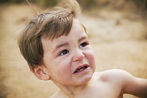 a small child crying