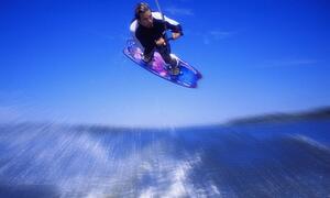 Man wakeboarding Coal Lake Alberta Canada