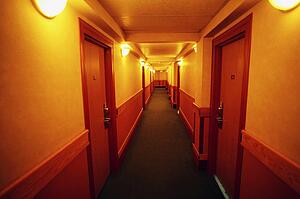 A narrow hallway in a hotel