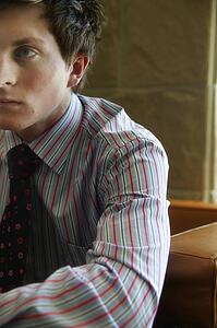 Man wearing a striped shirt