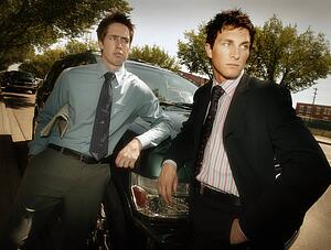 Two businessmen outside