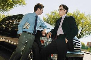 Two men have a conversation