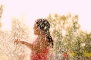 A child plays in the water
