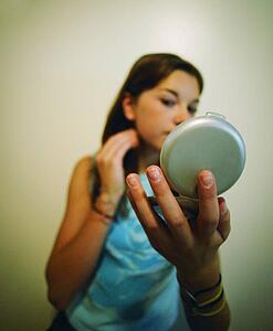 Applying makeup